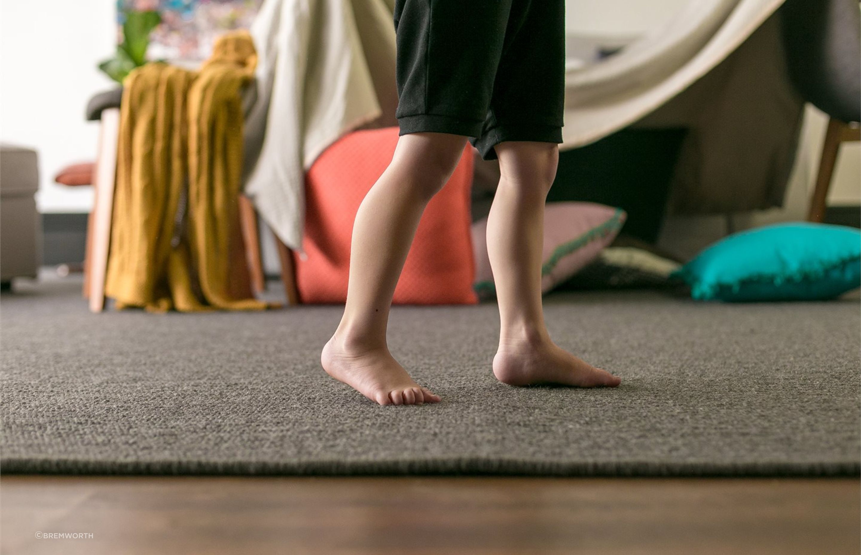 Dark coloured rugs like the Untouched Rug are often a solid practical choice when kids and pets are involved