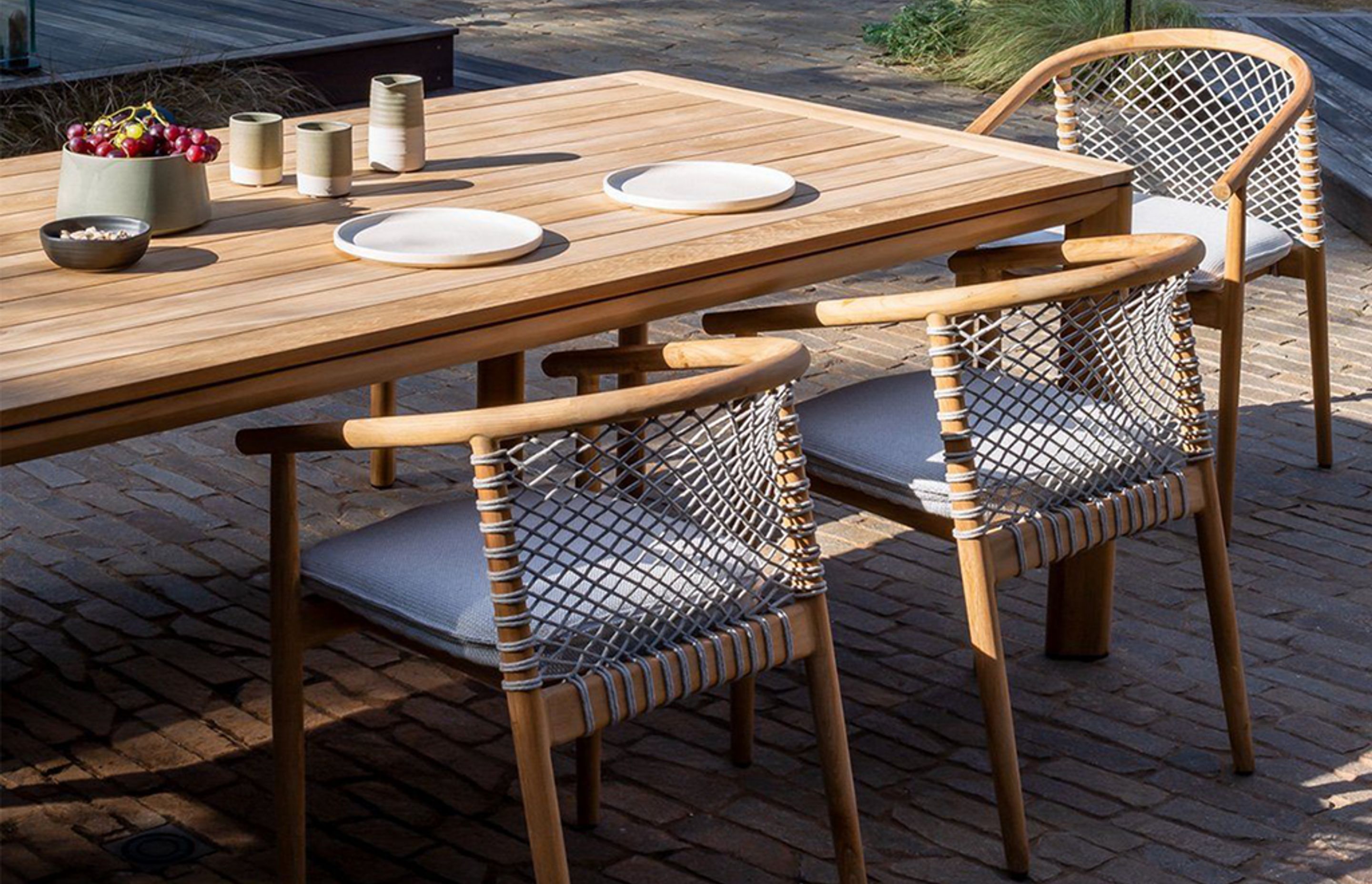 Pictured: Addis Teak Dining Table and Forrest Armchairs by Kett.