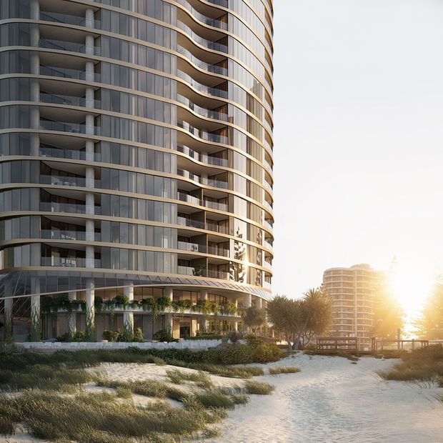 Architectural visualization of a contemporary multi-storey apartment building with a strongly curved facade, continuous rounded balconies, extensive floor-to-ceiling glazing, and warm metallic-toned horizontal bands. The building fronts a landscaped sandy coastal setting with dune grasses, palms, a pedestrian path, and a second rounded tower in the background, shown in low golden sunlight.