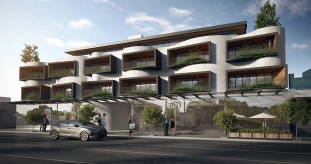 Architectural rendering of a contemporary multi-storey residential building with a long, low-profile form, flat roof, white rendered facade, dark projecting window surrounds, planted balcony boxes, extensive glazing, and a glazed ground-floor frontage. A street, pedestrians, landscaping, and a parked car appear in the foreground.