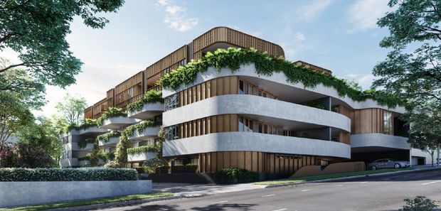 Contemporary multi-storey apartment building viewed from the street, with rounded projecting balconies, curved concrete balustrades, vertical timber-look cladding, extensive integrated greenery, and a landscaped frontage. The design has a layered, organic form with a dark recessed ground level and warm wood-toned upper facade elements.
