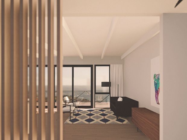 A contemporary living room viewed through a vertical timber slat divider. The room features dark-framed floor-to-ceiling glazing, a balcony beyond, a black sofa, timber flooring, a patterned area rug, a low timber media console, and a white ceiling with exposed boxed beams.