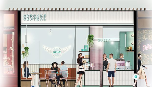 A stylised architectural storefront rendering of a Cupcake Central retail café. The glazed shopfront has a prominent white and pale mint-green branded façade, illuminated signage, display shelving, a service counter, café seating, and several people shown inside and near the entrance. Vertical fins or slatted detailing run along the upper edge, while the interior uses light timber, white, and mint finishes.
