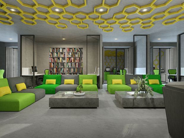 A spacious contemporary living room or lounge with vivid lime-green and grey sectional sofas arranged around low rectangular concrete-look coffee tables. The room features a large built-in bookcase, dark-framed glazed partitions, grey flooring and walls, and a highly distinctive ceiling covered with repeated yellow-edged hexagonal acoustic or decorative panels and recessed downlights. Green dining or desk chairs and louvred window treatments are visible in the background.