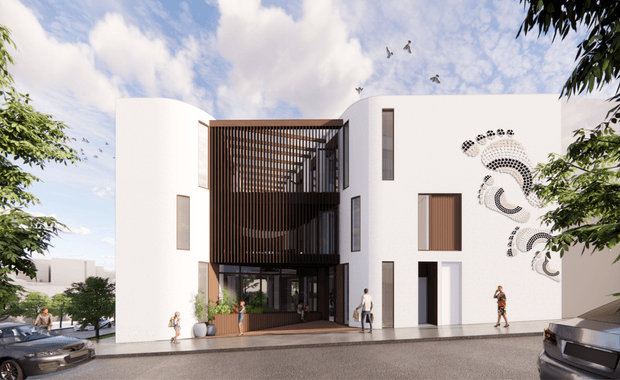 Architectural rendering of a contemporary multi-storey white building with rounded facade volumes, a recessed central entrance, dark vertical timber or metal screening, extensive glazing, and narrow vertical windows. A large abstract black-and-white mural adorns the right facade. The building fronts a paved urban street with parked cars, pedestrians, mature trees, and a partly cloudy sky.
