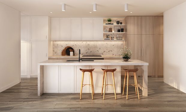 Bright, refined contemporary kitchen with a large stone island and integrated seating for three. White shaker-style cabinetry lines the back wall, complemented by a timber-toned full-height cabinet bank, open display shelving, a tiled backsplash, dark fixtures, and wide-plank timber-look flooring.