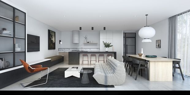 A bright open-plan contemporary interior combining a kitchen, dining area and living room. The space features white walls and cabinetry, a large island with bar seating, pale timber flooring, dark built-in shelving and cabinetry, a grey sectional sofa, black dining furniture, expansive sheer-covered glazing, and sculptural pendant lighting.