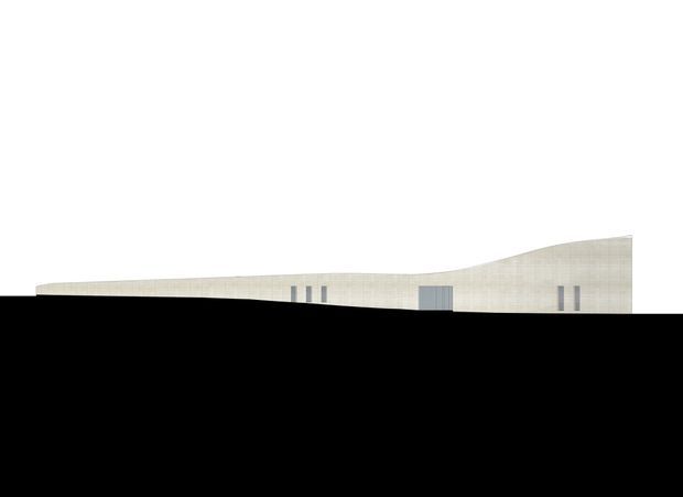 Minimal architectural elevation or rendering of a long, low building with a gently rising curved roofline and pale textured facade. The elevation shows sparse narrow vertical windows and a central grey entrance or door, set against a plain white background with no surrounding site context.