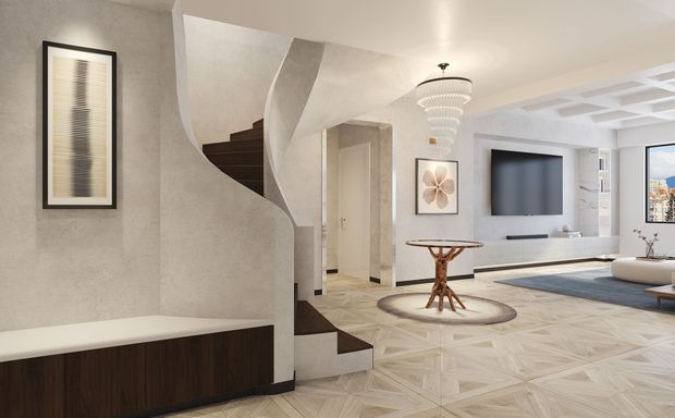 A refined contemporary living room and entry area with a sculptural curved staircase, dark timber built-in bench, pale patterned timber flooring, statement pendant light, wall-mounted television, and sculptural console table. The space has textured light walls, geometric ceiling detailing, and large windows providing an urban outlook.