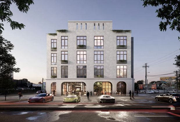 A rendered street-level exterior view of a mid-rise contemporary building with a pale textured facade, tall gridded windows, planted roof edges and window boxes, and a recessed ground-floor frontage with large rounded-arch glazed openings. The building sits on an urban street with pedestrians and parked or passing cars visible in the surrounding context.