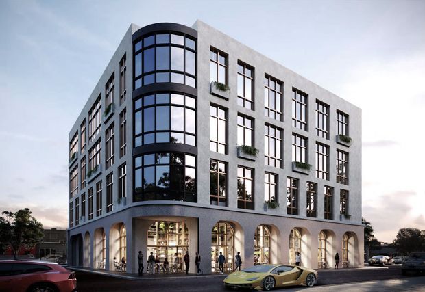 Exterior architectural rendering of a multi-storey contemporary urban building with a grey masonry or concrete facade, strong vertical window bays, a rounded glazed corner, planted window boxes, and a ground-level arcade of tall arches enclosing retail or commercial spaces. Cars and pedestrians are shown at street level.