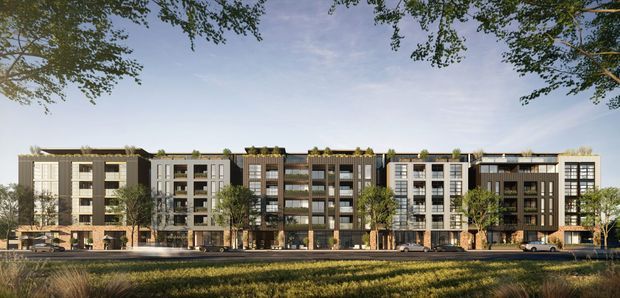 Architectural rendering of a contemporary multi-storey apartment building viewed from across a landscaped foreground. The long facade is composed of varied projecting and recessed volumes, extensive windows and balconies, dark and light cladding, ground-level entries or commercial-style glazing, and planted roof terraces or green roof sections. Mature trees frame the scene, with a street and limited vehicles in front.
