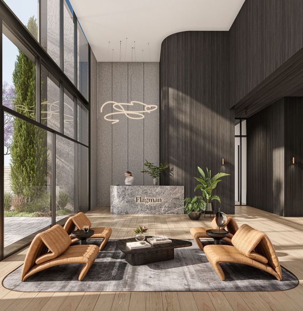 A high-end lobby or reception area with a double-height ceiling, floor-to-ceiling glazing, dark vertical timber wall panelling, pale stone reception desk, and light timber flooring. Four sculptural tan lounge chairs surround a low dark coffee table on a large neutral rug. Indoor plants, a linear pendant installation, and a landscaped exterior visible through the glazing complete the refined contemporary interior.