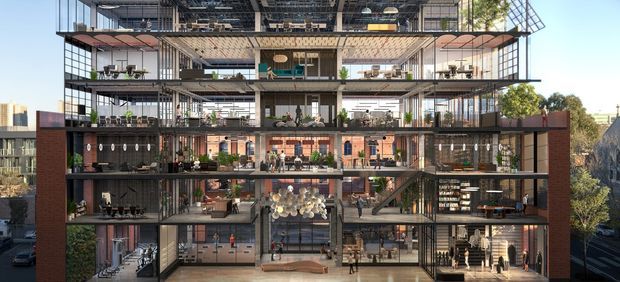 Architectural cutaway rendering of a multi-storey mixed-use commercial building, showing open-plan interior levels with cafes, retail or hospitality areas, workspaces, terraces, extensive glazing, exposed structural framing, and a central vertical atrium. Brick-clad side walls contrast with steel and glass construction.