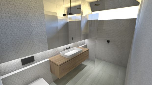Contemporary bathroom interior featuring a floating timber vanity with a white vessel basin, large wall mirror, wall-hung toilet partially visible at left, and walk-in shower area. Small light hexagonal tiles cover the walls, with pale large-format floor tiles and suspended pendant lighting. The space is bright, clean, and minimalist in appearance.