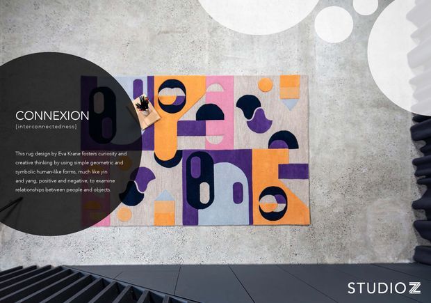 A graphic art installation titled “CONNEXION” mounted on a textured grey concrete wall. The colourful geometric artwork uses orange, purple, navy, pink, blue and yellow blocks with circles, arches and abstract forms. Large black and white circular graphic shapes are painted or printed on the surrounding wall. Dark sculptural architectural elements frame the lower and right edges, creating a contemporary gallery or commercial interior setting.