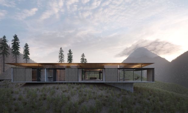A wide architectural rendering of a long, low-profile contemporary house elevated slightly above a grassy mountain slope. The home features extensive floor-to-ceiling glazing, dark vertical cladding panels, warm timber soffits and framing, and a thin projecting flat roof. Tall conifers and a dramatic mountain landscape form the background, with soft atmospheric evening light.