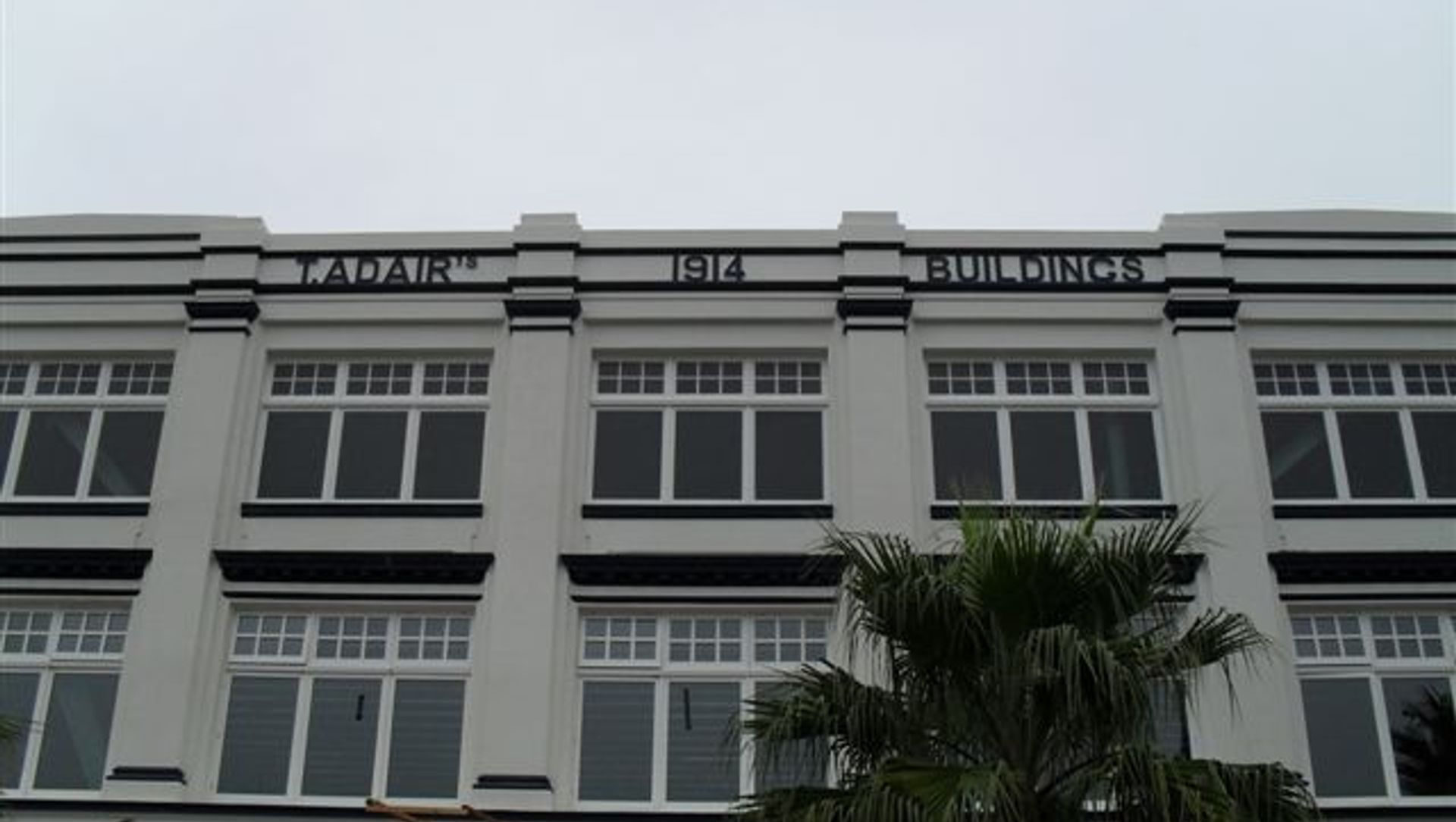 T Adair Gisborne banner