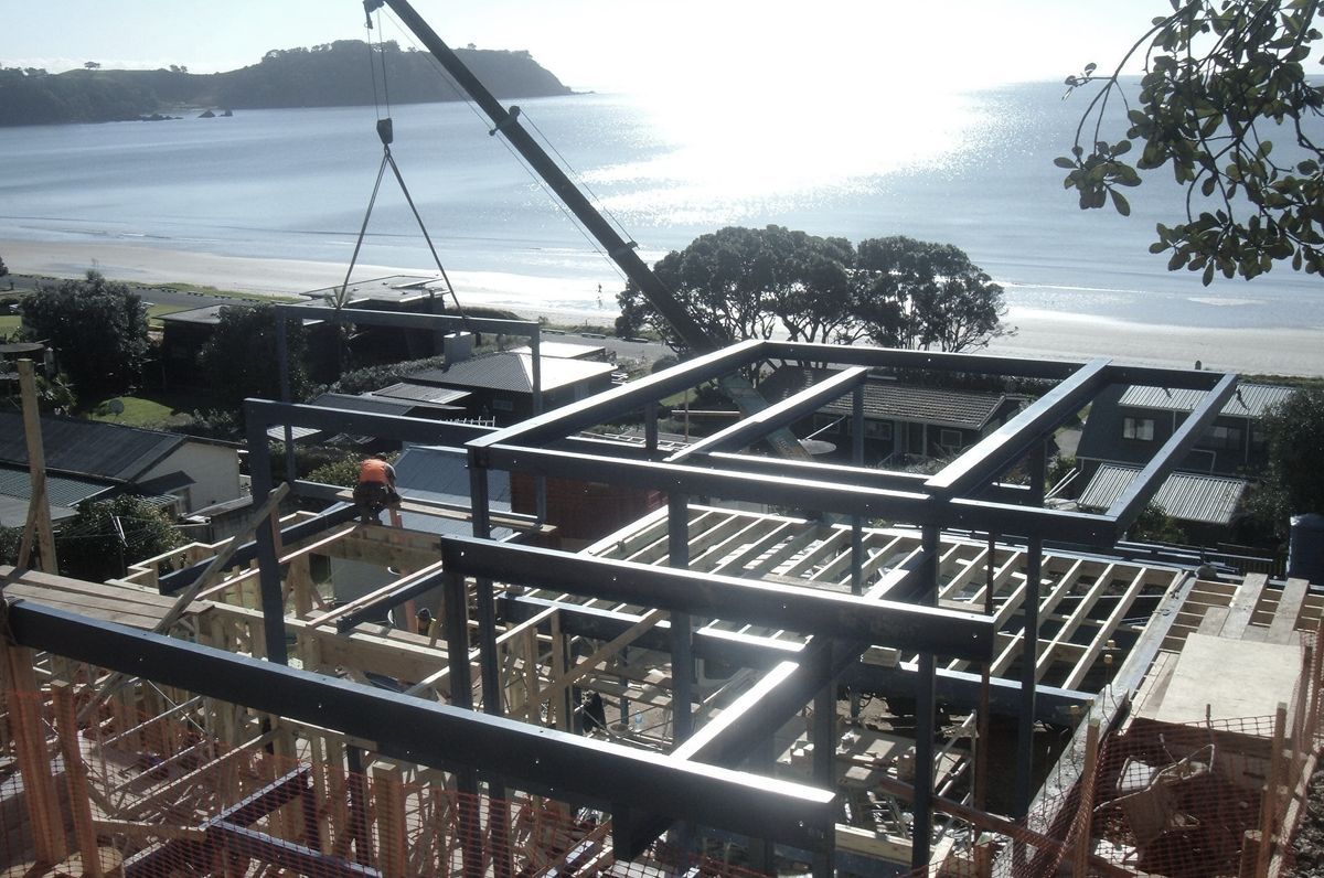 Tomik Architectural Builders