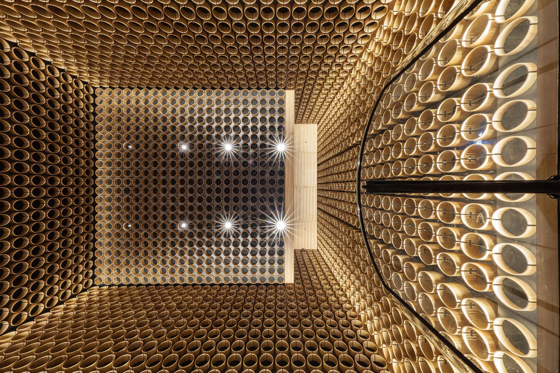 Timber hoops create a work of art above.