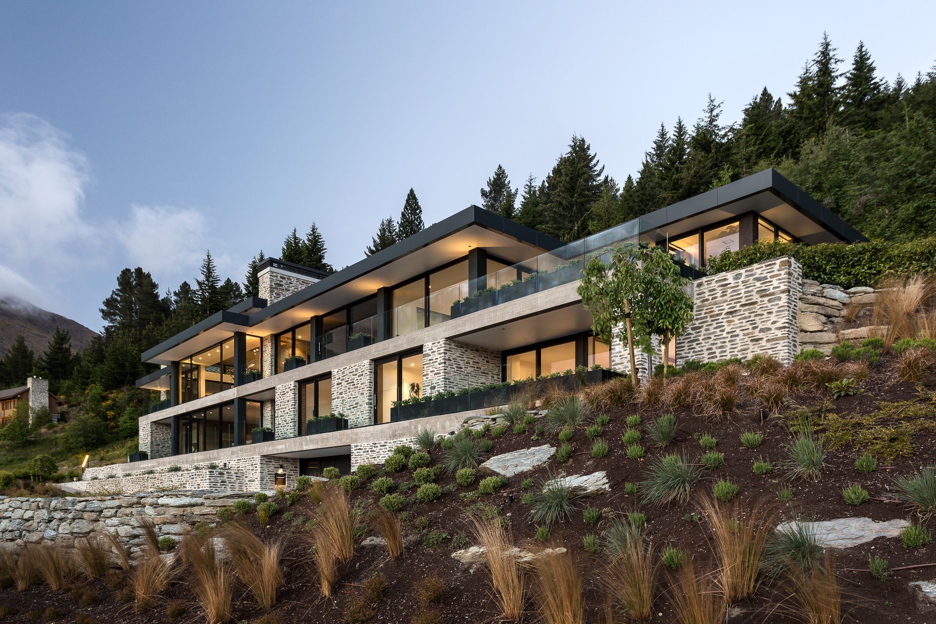 A sophisticated use of elegant concrete, stone and black steel graces the exterior of Stelvio, The Peak by Mason &amp; Wales Architects. | Photography: Jamie Cobel