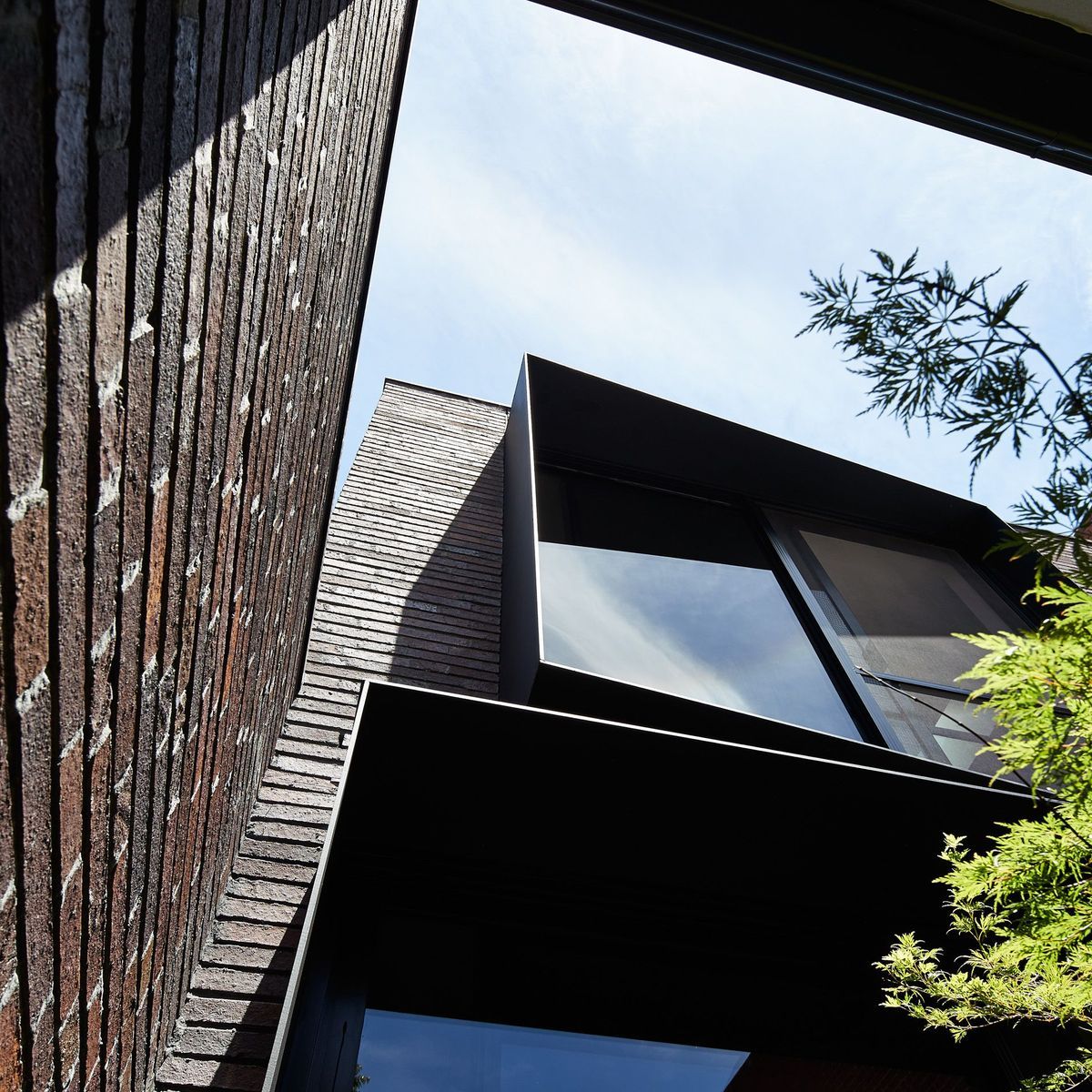 A monochromatic modern architectural feat immersed within a heritage building