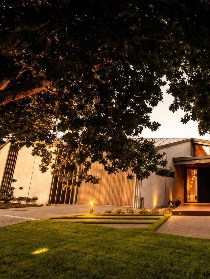 Addison Street features a cedar garage door so it disappears into the timber façade.