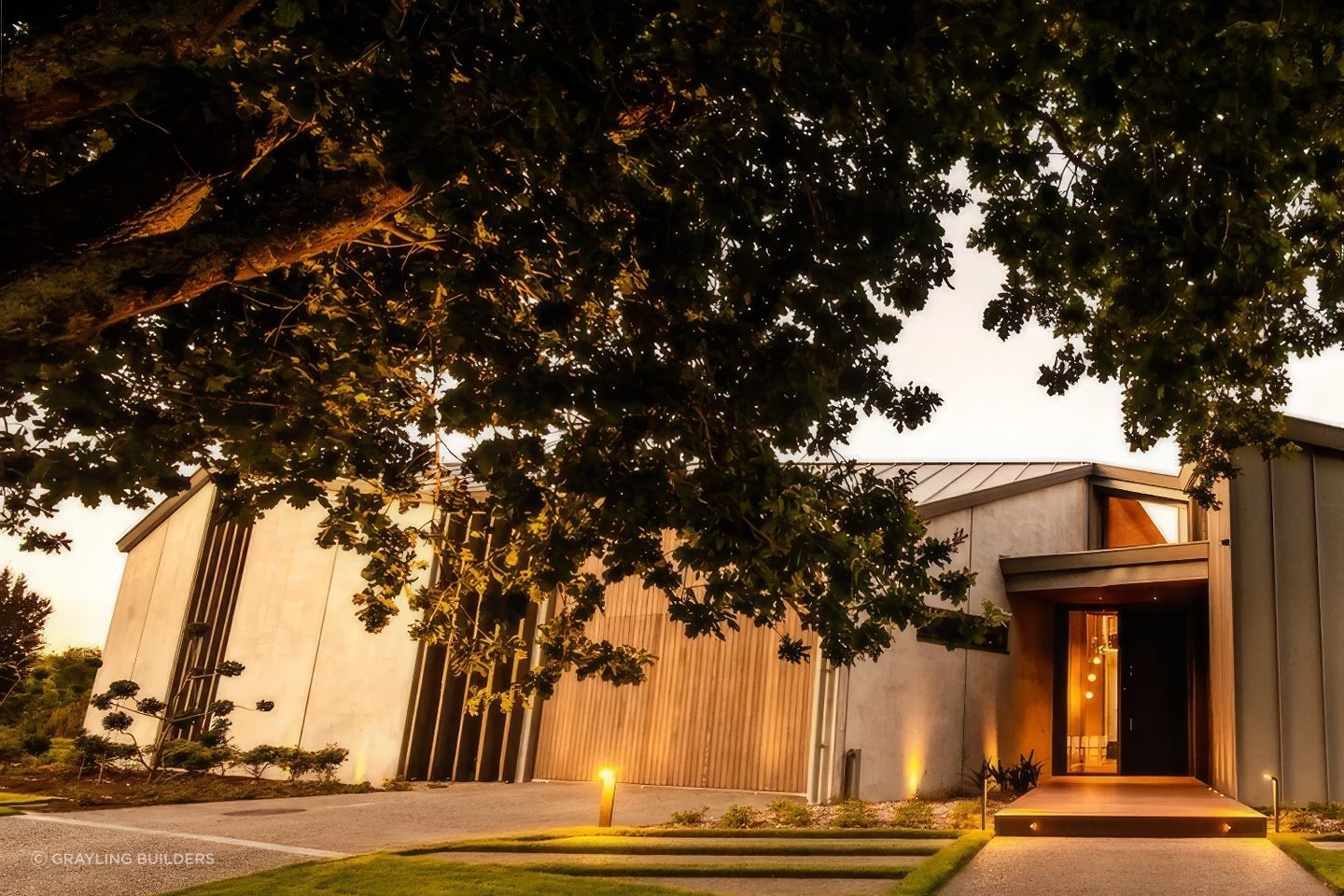 Addison Street features a cedar garage door so it disappears into the timber façade.