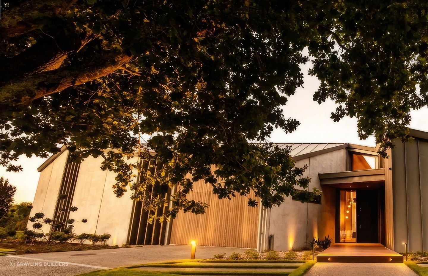 Addison Street features a cedar garage door so it disappears into the timber façade.