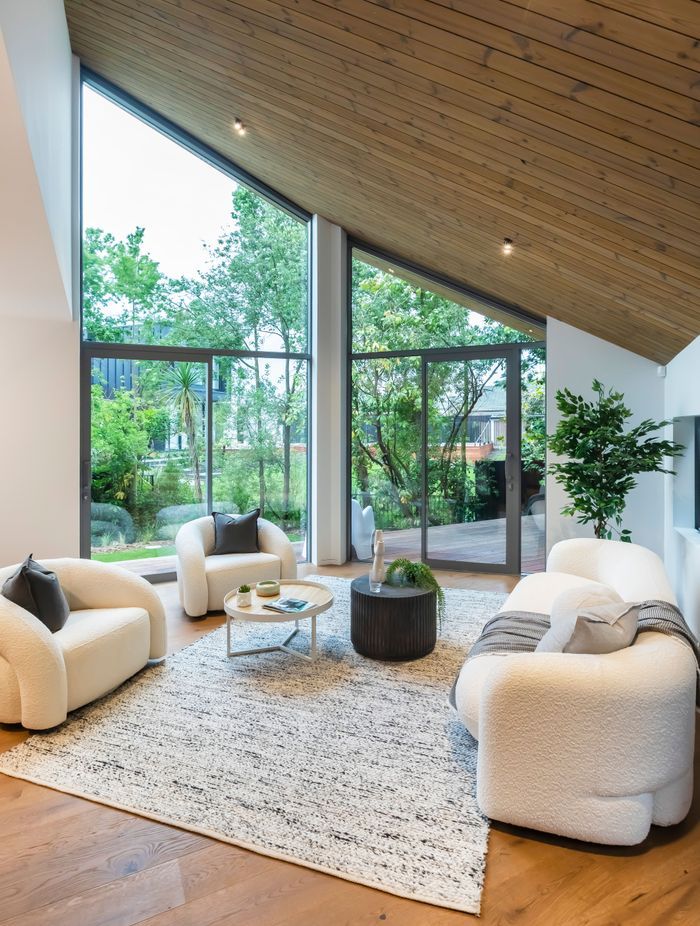 A minimalist palette draws the eye to the stunning ceilings.