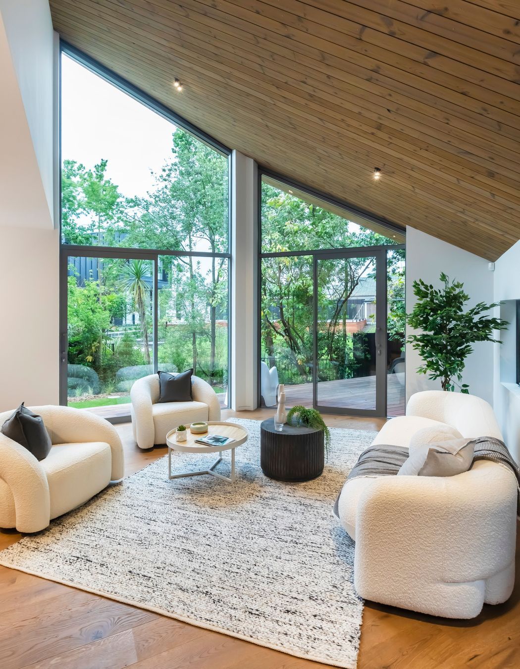 A minimalist palette draws the eye to the stunning ceilings.