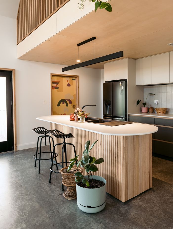 The hub of the home tucks under the loft space.