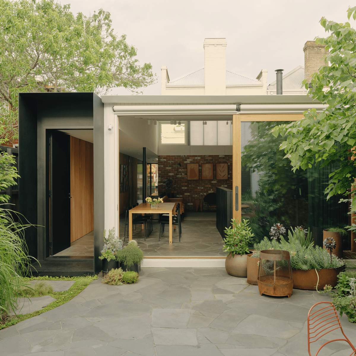 An architect-owner's eclectic laneway home that restores Victorian features with a contemporary twist