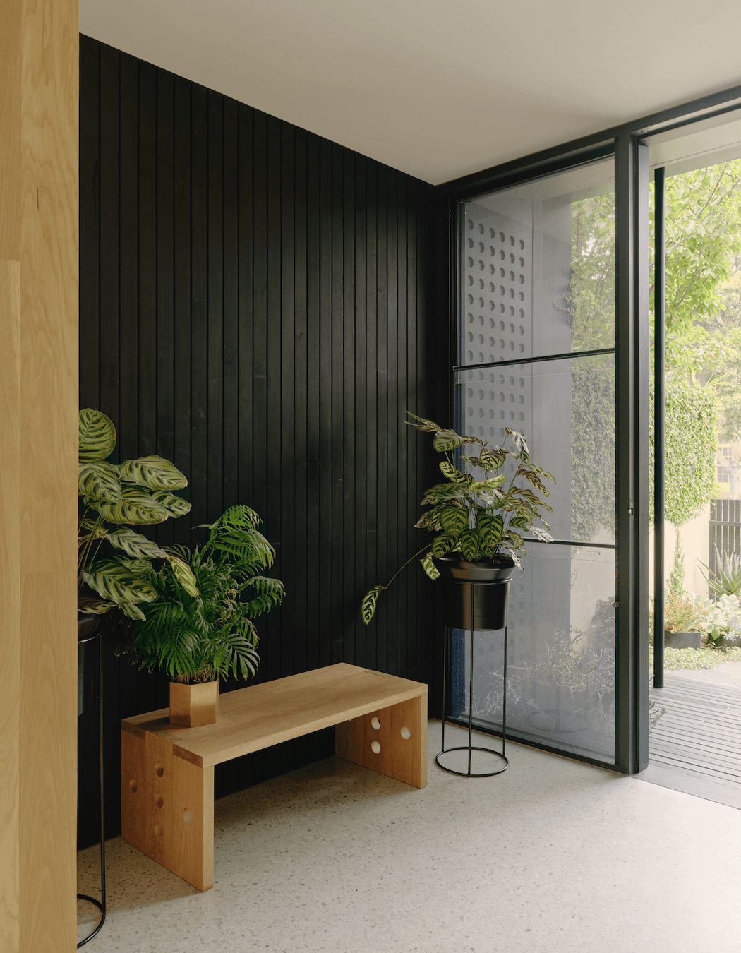 A deliberate blurring of boundaries between inside and out fosters a spacious, open feel, unlike the traditional formality of Victorian architecture.