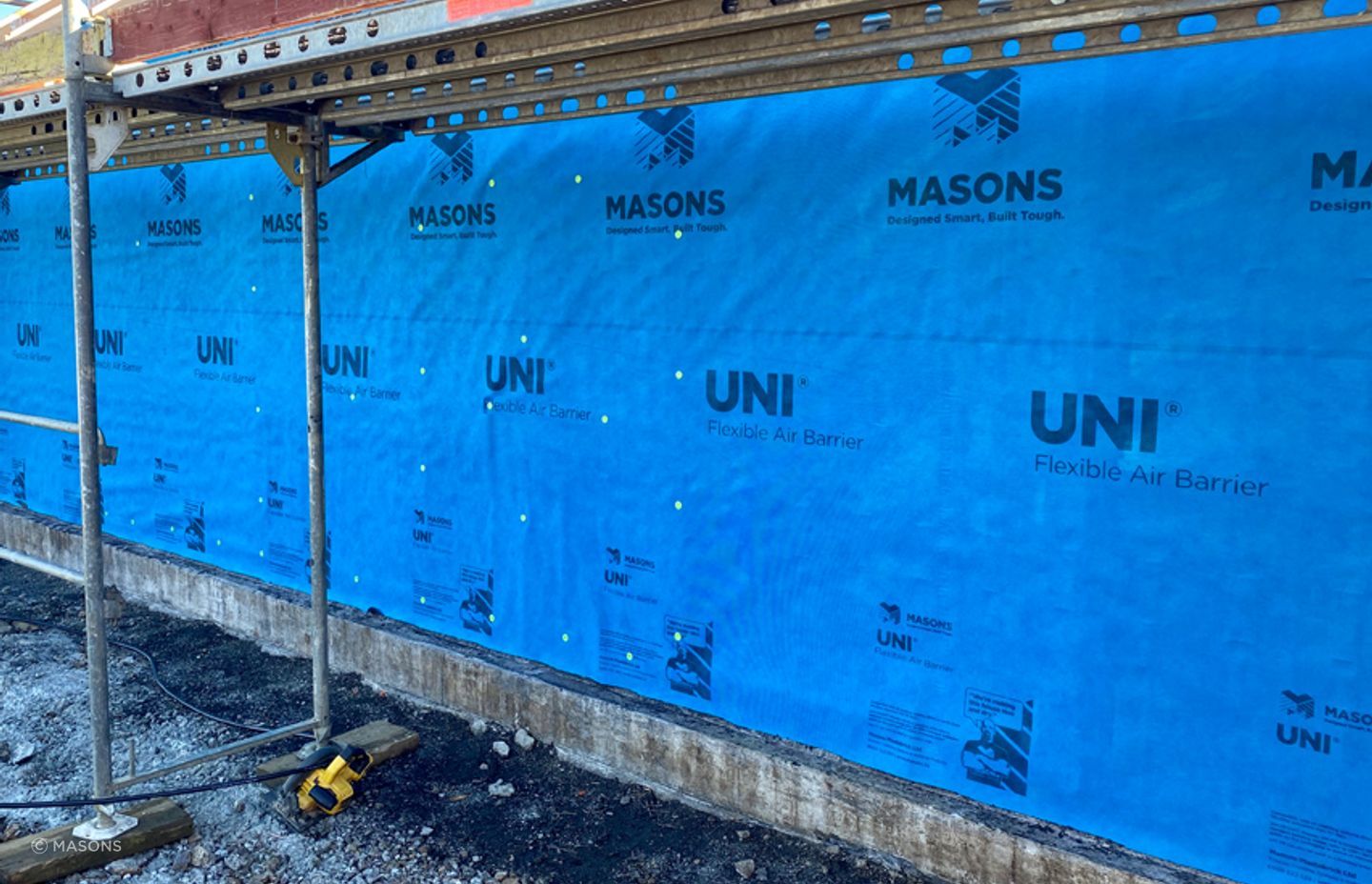 UNI FR is a flexible air barrier with unique reinforcing and water-resistant features that allows work to continue on the inside of the building for up to 90-days, without waiting for the cladding to be complete.