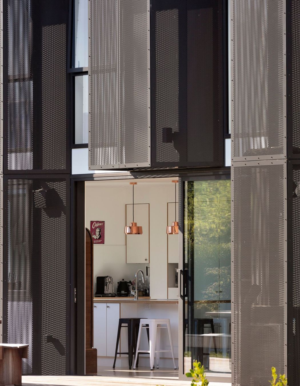 A close-up of the angled mesh screens on Arthurs Point Steel House by Team Green Architects. Photograph by Sam Hartnett.