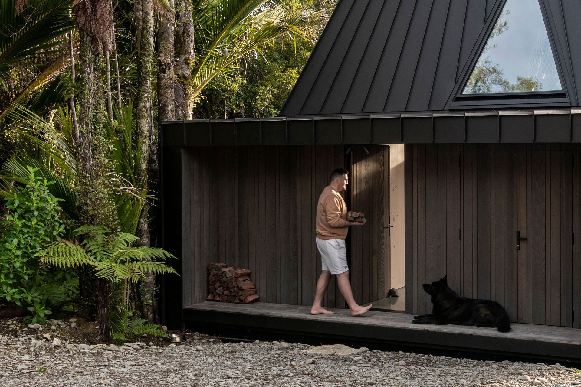 The entry to the home forms a sheltered structure out of the weather.