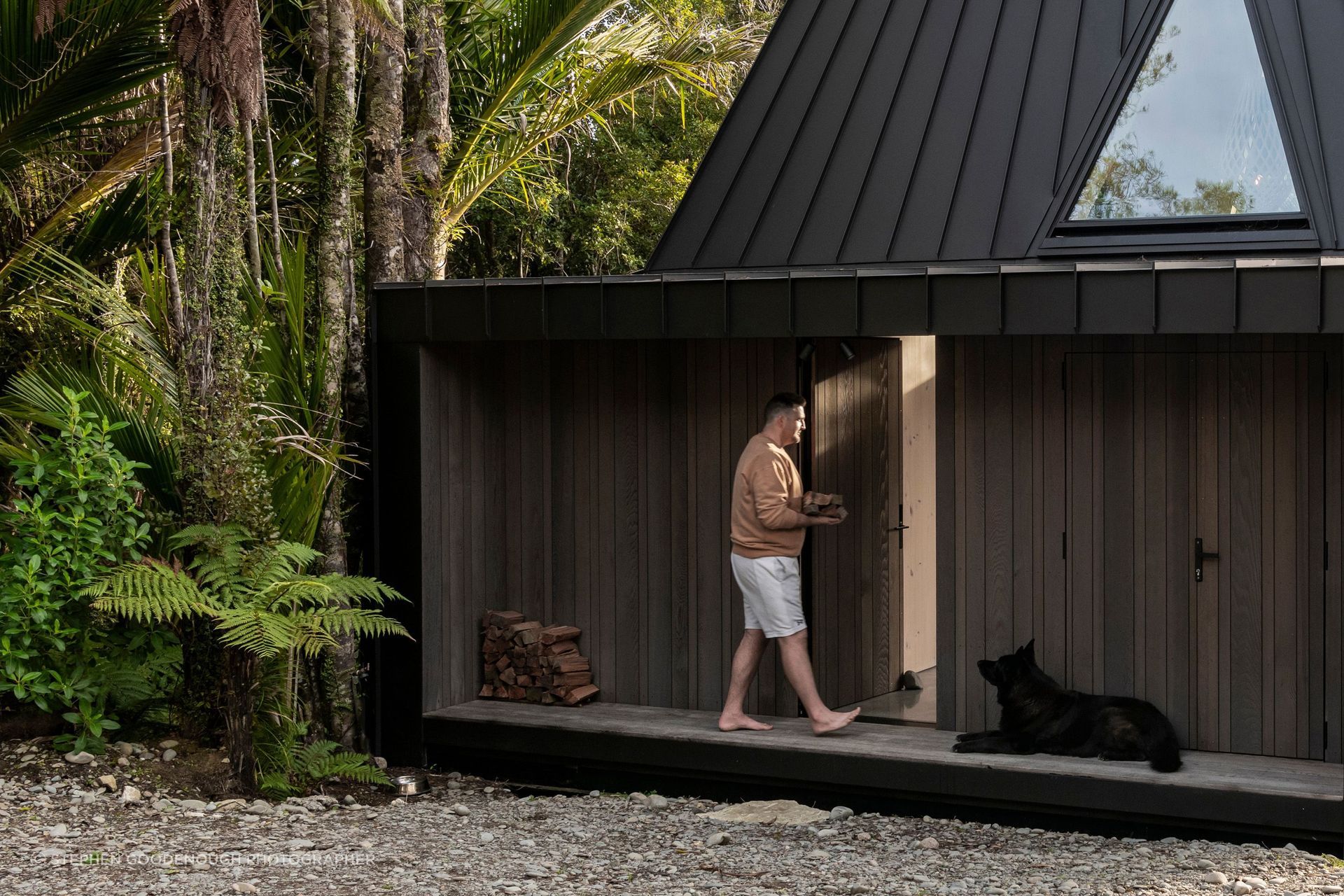 The entry to the home forms a sheltered structure out of the weather.