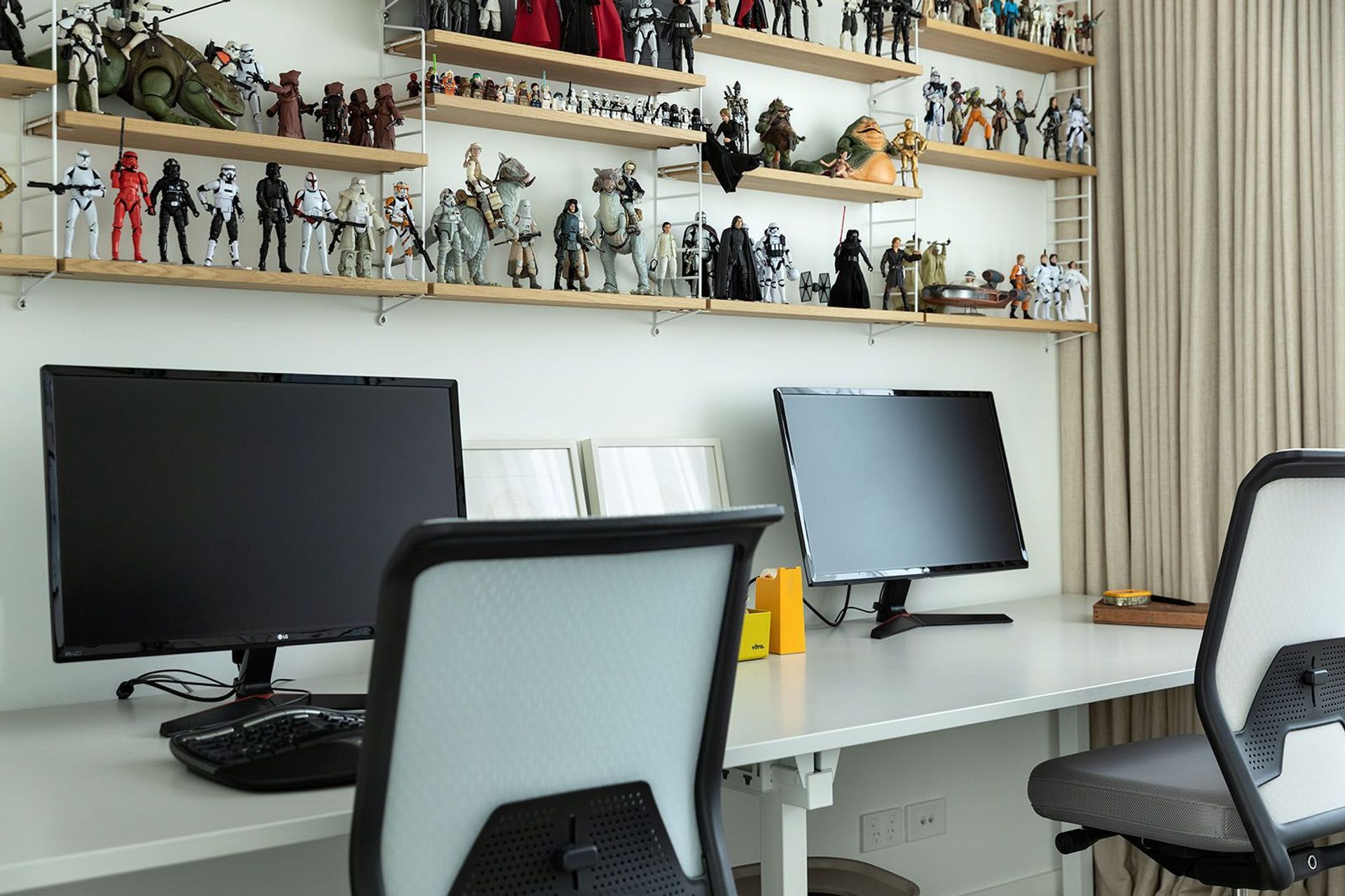 Working from home has never seemed so good. Dedicated work spaces add the bonus of being able to individualise your interior decoration with Star Wars figurines – or whatever takes your fancy. Photographs (above and below) by Simon Devitt.