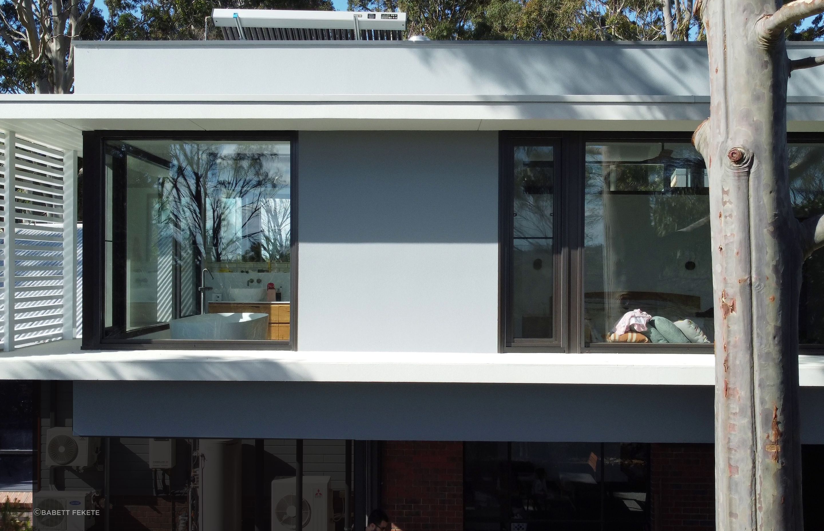 Externally, it’s all steel-framed cladding, expansive windows and a classically minimalistic appeal.