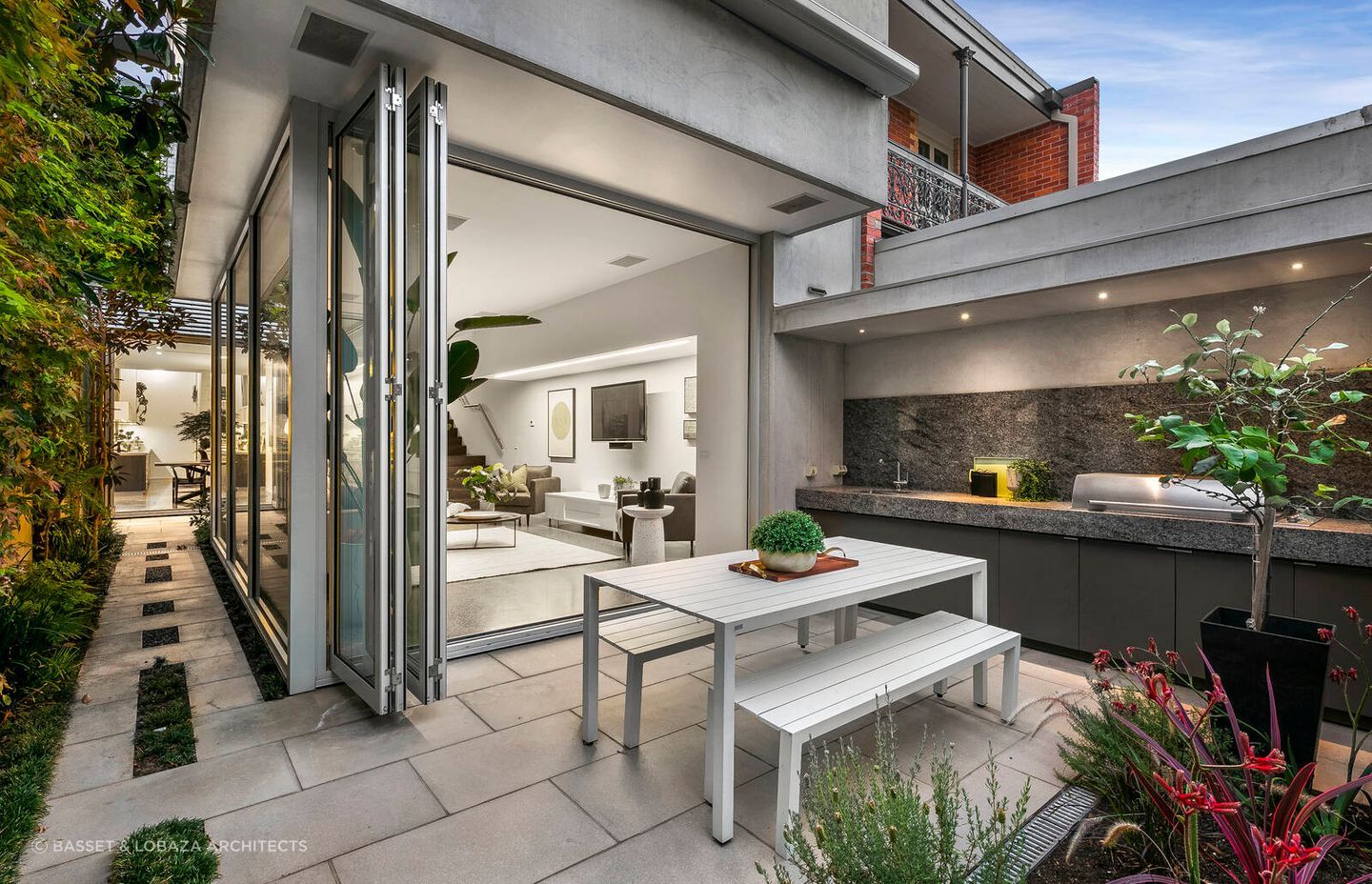 The brief was to provide separate sections but connect them together in a sleek, meaningful way – all within a five-metre wide site.