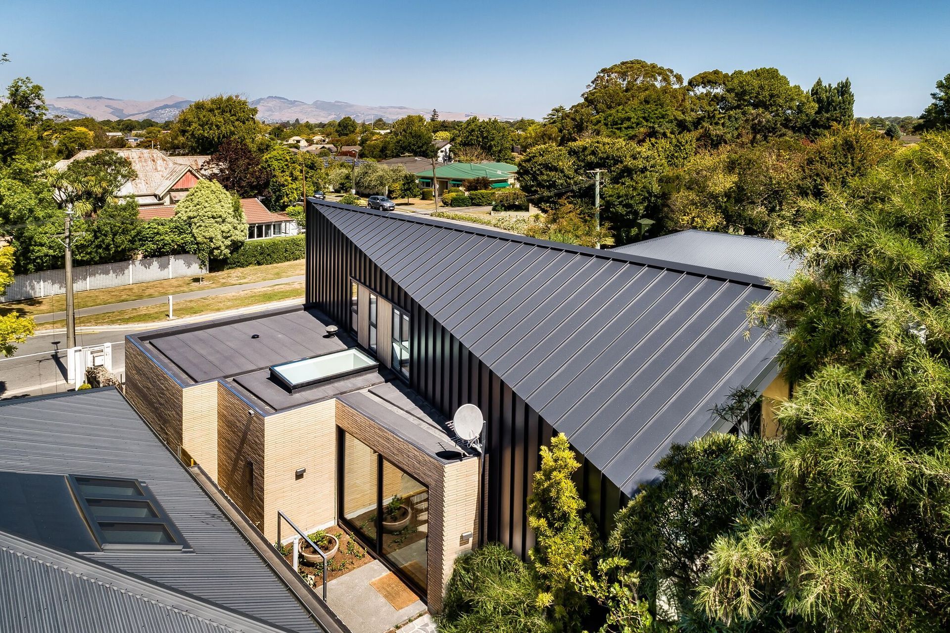 The placement of windows ensures a light-filled interior at Hawthorn Street House, Christchurch, by Sheppard & Rout Architects.