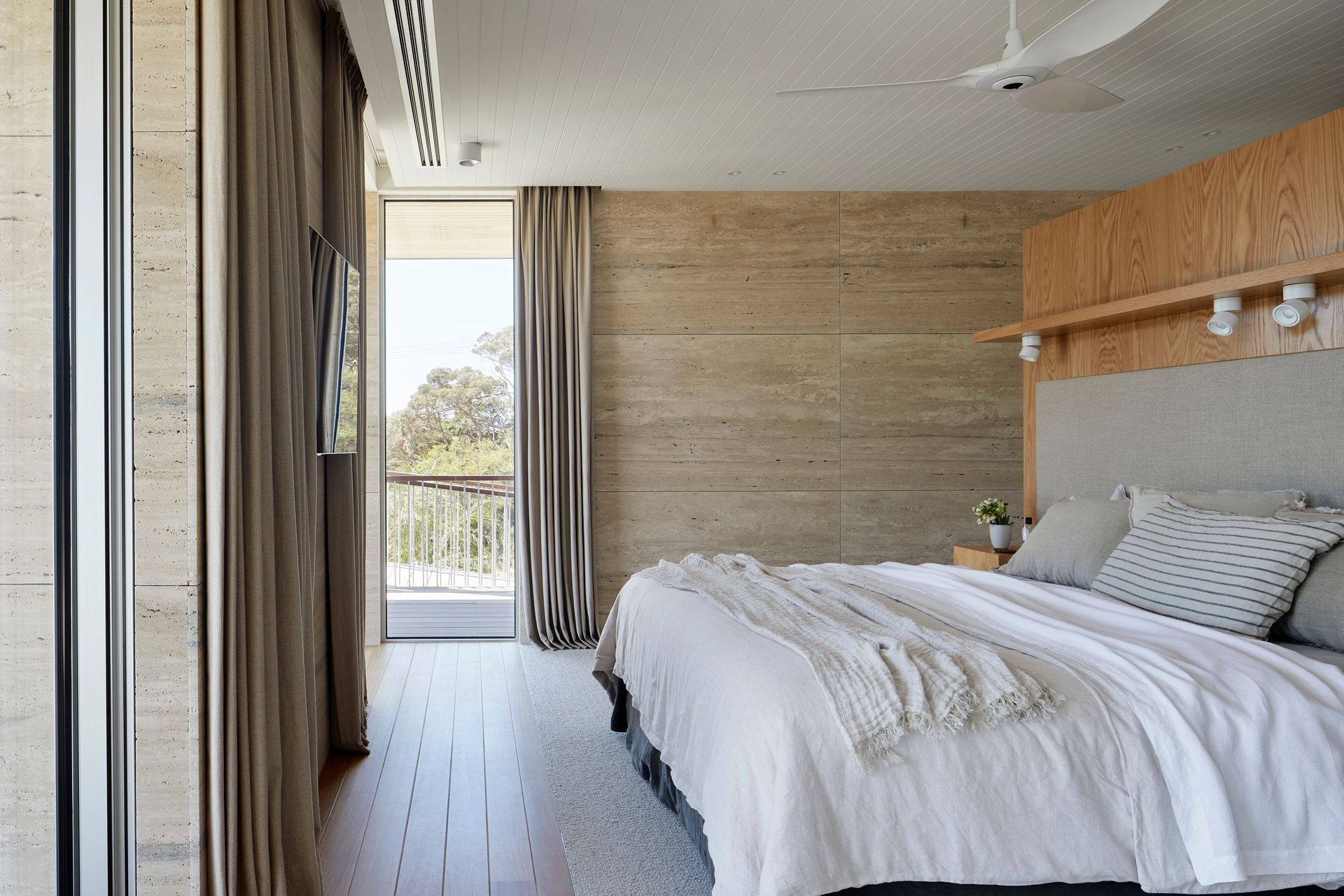 The main bedroom is a coastal oasis.