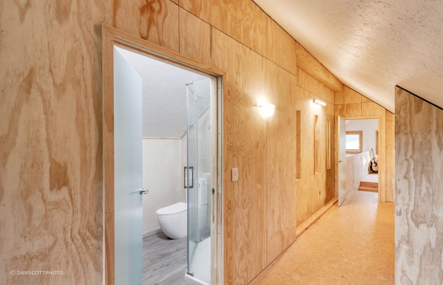 The sustainable vinyl bathroom flooring is by Inzide.