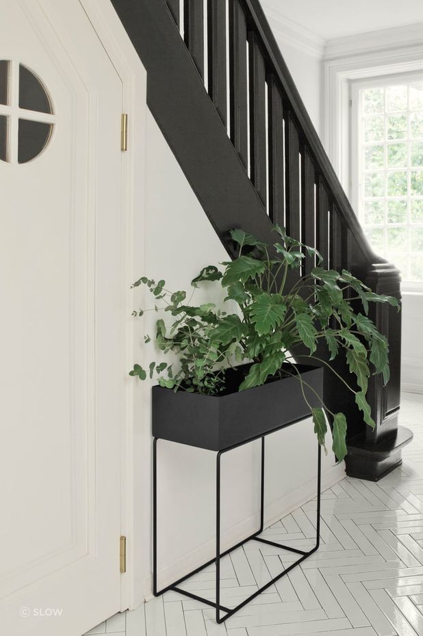 With planter boxes like this black steel model from SLOW, nature can easily be brought inside.