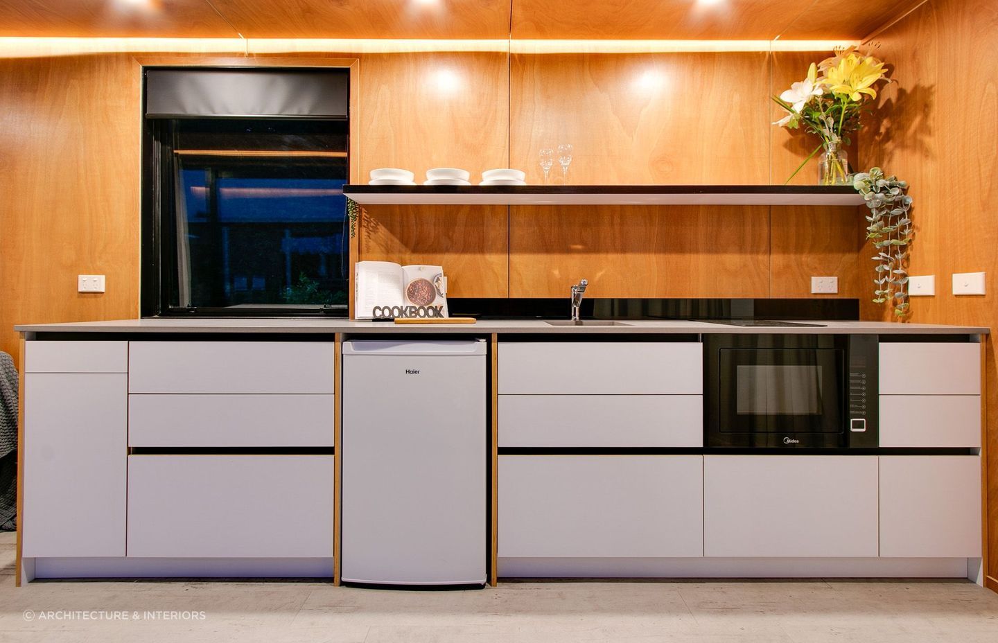The galley-styled kitchen was the perfect solution to the rectangular shape the designers were working with