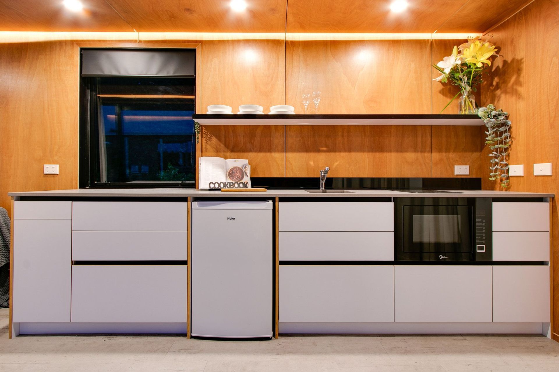 The galley-styled kitchen was the perfect solution to the rectangular shape the designers were working with