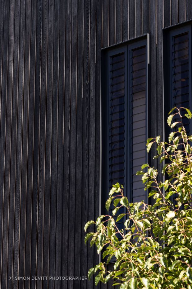 Custom shiplap cedar cladding by Rosenfeld Kidson & Co.