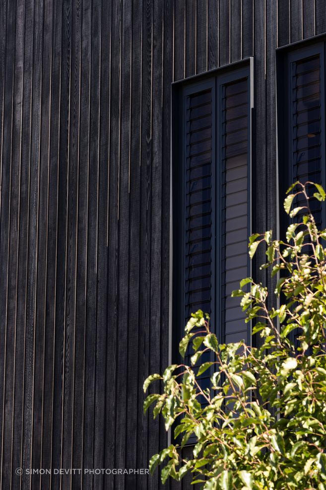 Custom shiplap cedar cladding by Rosenfeld Kidson &amp; Co.