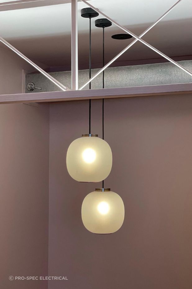 'Common Space Studio' sees a culmination of raw and structural design elements, so opting for beautiful pendants that offer soft lighting was the perfect choice to compliment the space's aesthetic.